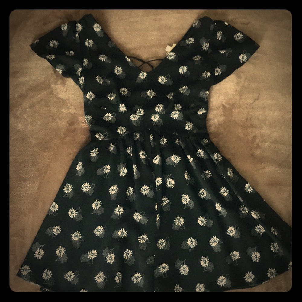 Black romper with daisy design